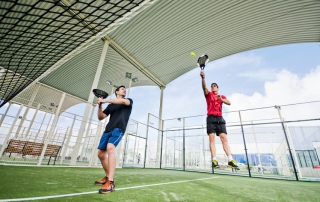 Paddle tennis player ready for match