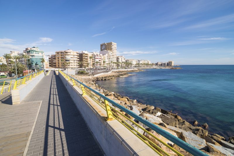 Torrevieja, Spain - December 31, 2015: People enjoying a sunny end of the year in one of Spains most popular tourist resorts